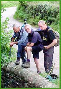 Peter, Mick and Ray looking for fish. (Yet another Larry photo)